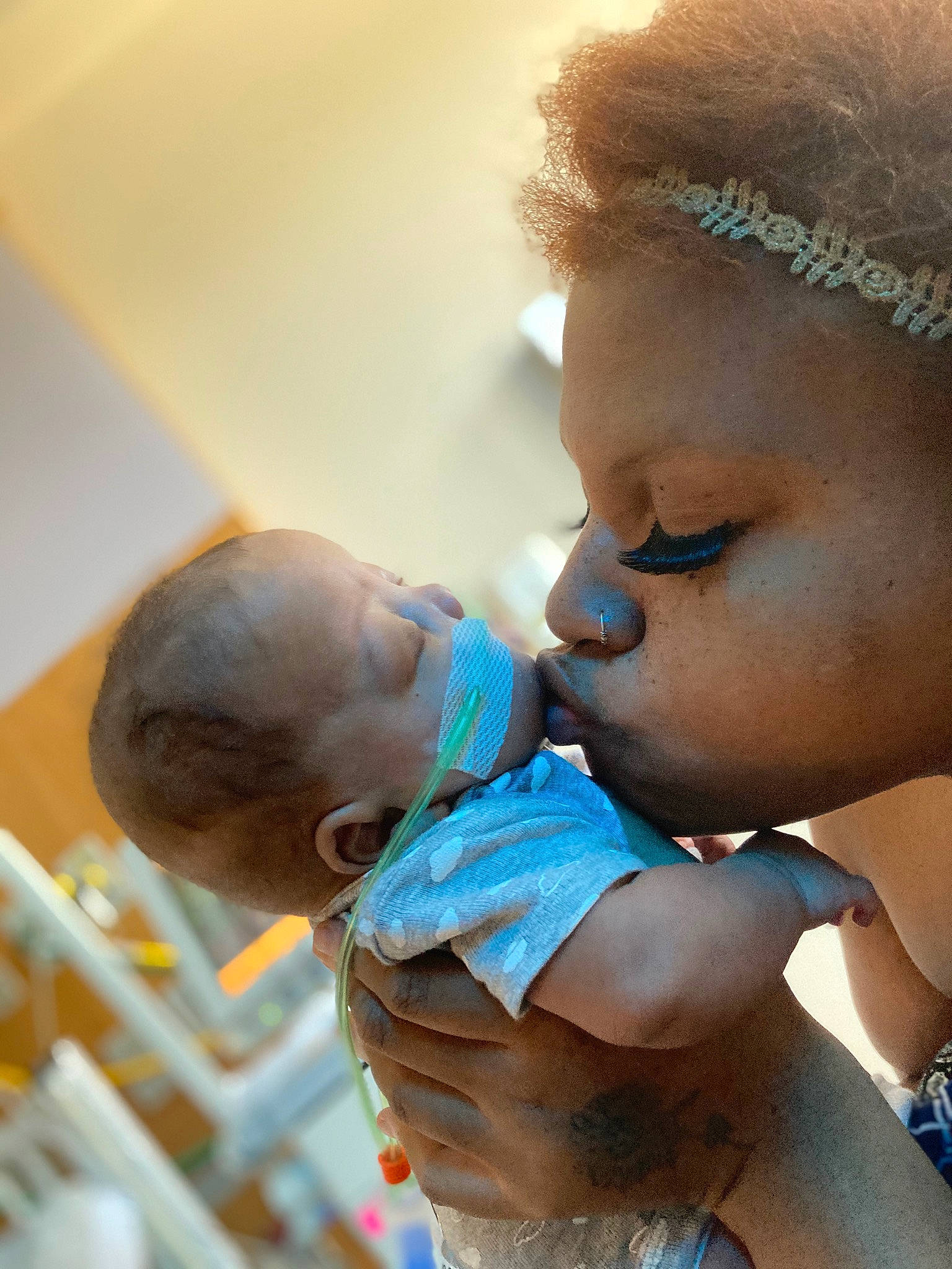 Camden is registered to the contest to win money with this photo: baby, child, ear, earrings, event, eyelash, eyewear, fun, gesture, happy, headband, headpiece, hug, iris, jewellery, leisure, lip, love, person, skin