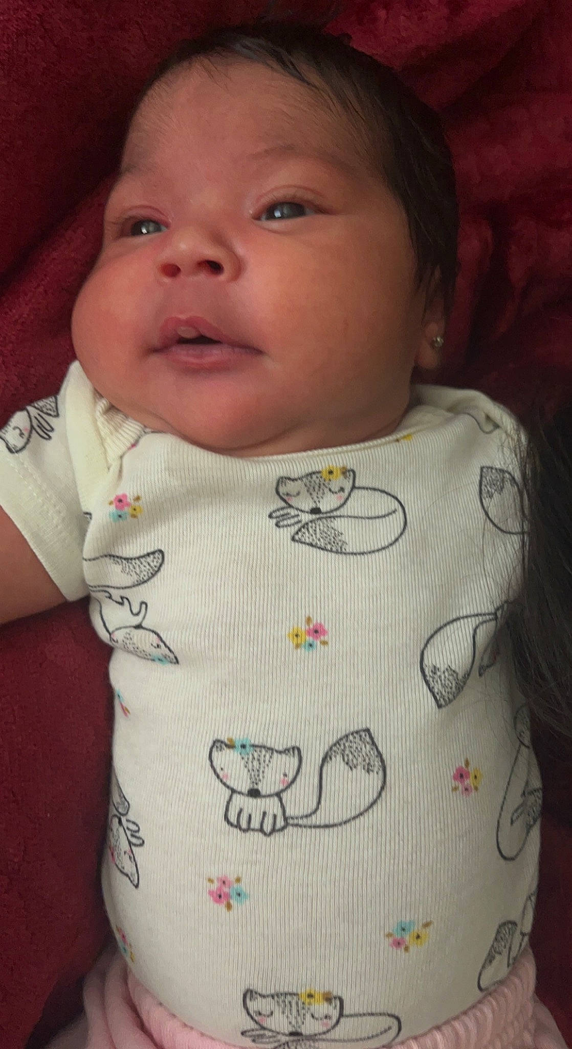 Hadelynn is registered to the contest to win money with this photo: baby, baby_toddler_clothing, bib, cheek, eyelash, facial_expression, forehead, human_body, iris, lip, neck, nose, organ, outerwear, person, pink, product, skin, sleeve, t_shirt