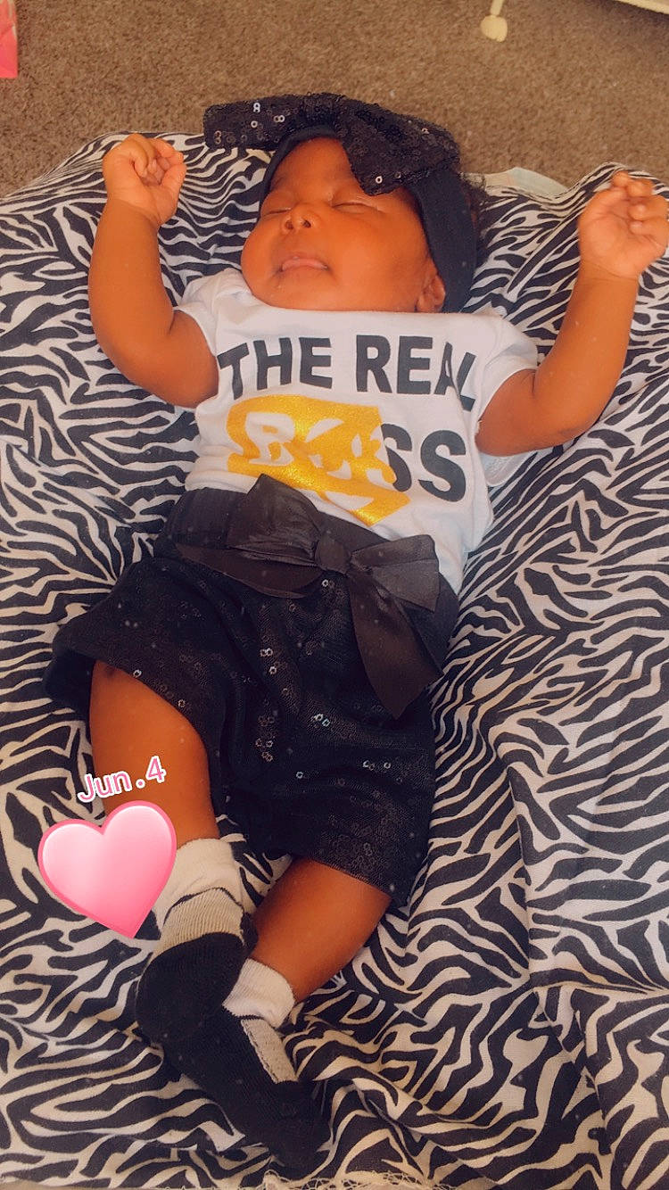 C'Ianna joined the competition — help win amazing prizes! baby_toddler_clothing, beauty, black, child, comfort, finger, hairstyle, happy, human_leg, lap, leg, pattern, people, person, pink, sleeve, t_shirt, textile, thigh, toddler