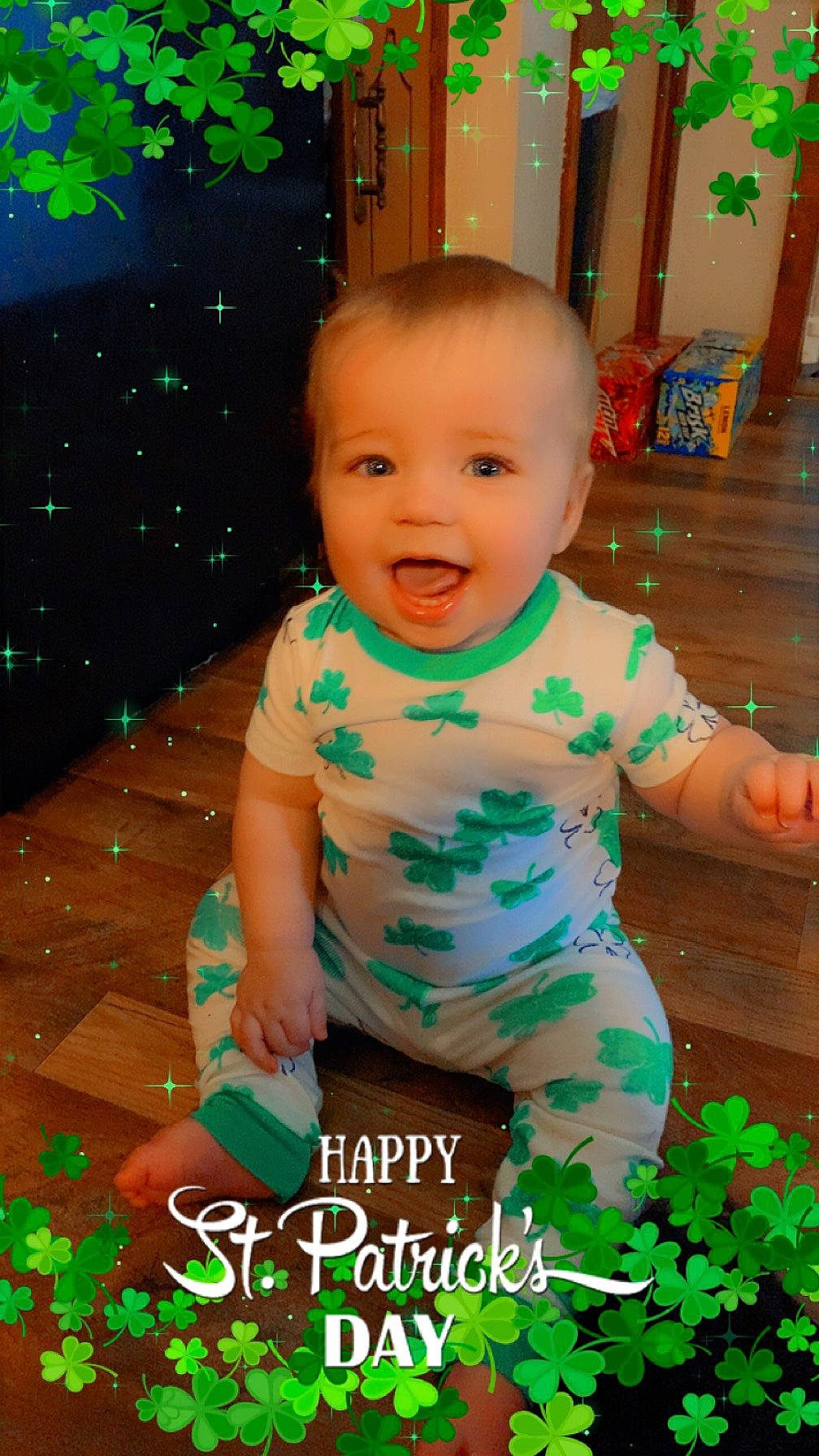 Lawson is registered to the contest to win money with this photo: baby, baby_toddler_clothing, child, flooring, fun, grass, green, happy, pattern, people_in_nature, person, plant, play, room, sitting, skin, smile, standing, t_shirt, toddler