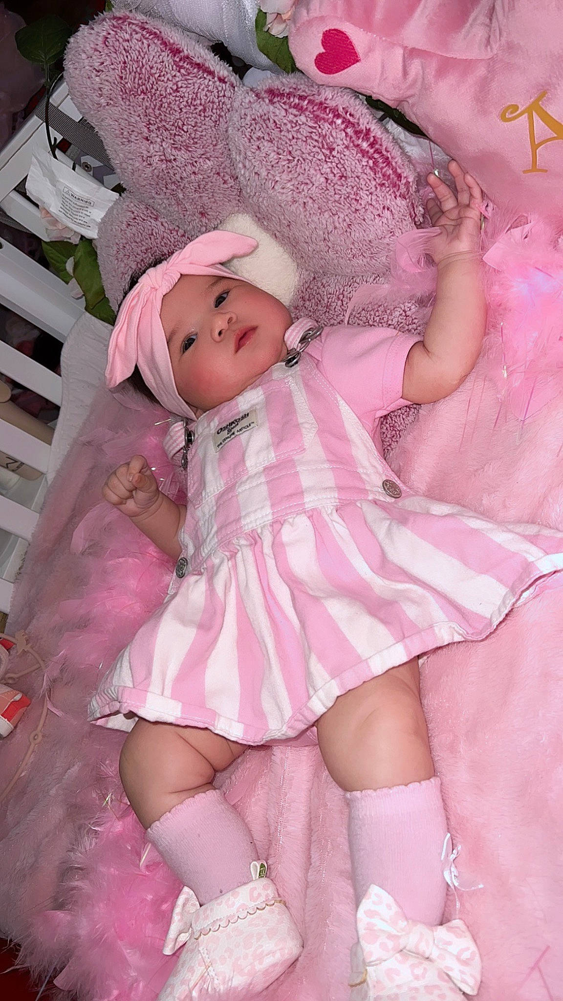 Aylen joined the competition — help win amazing prizes! baby, baby_toddler_clothing, child, day_dress, dress, embellishment, fashion_accessory, fashion_design, headwear, human_leg, magenta, pattern, peach, person, pink, purple, ruffle, skin, textile, thigh