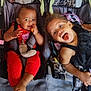 baby, bodypart, clothing, cream, dessert, eating, face, food, furniture, hair, happy, head, icecream, mouth, people, person, photography, portrait, stroller, t_shirt