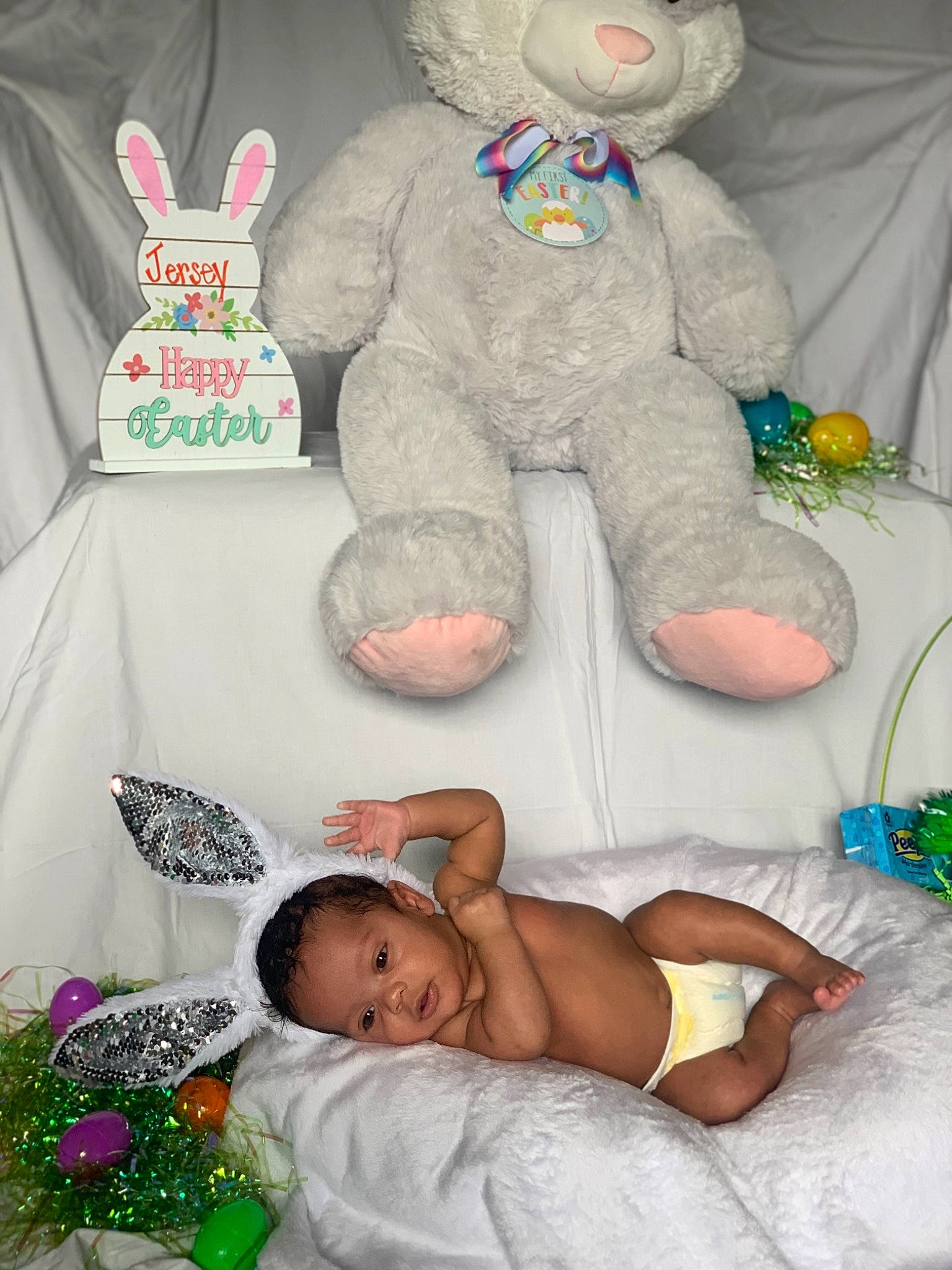 Jersey is registered to the contest to win money with this photo: baby, child, easter_bunny, person, stuffed_toy