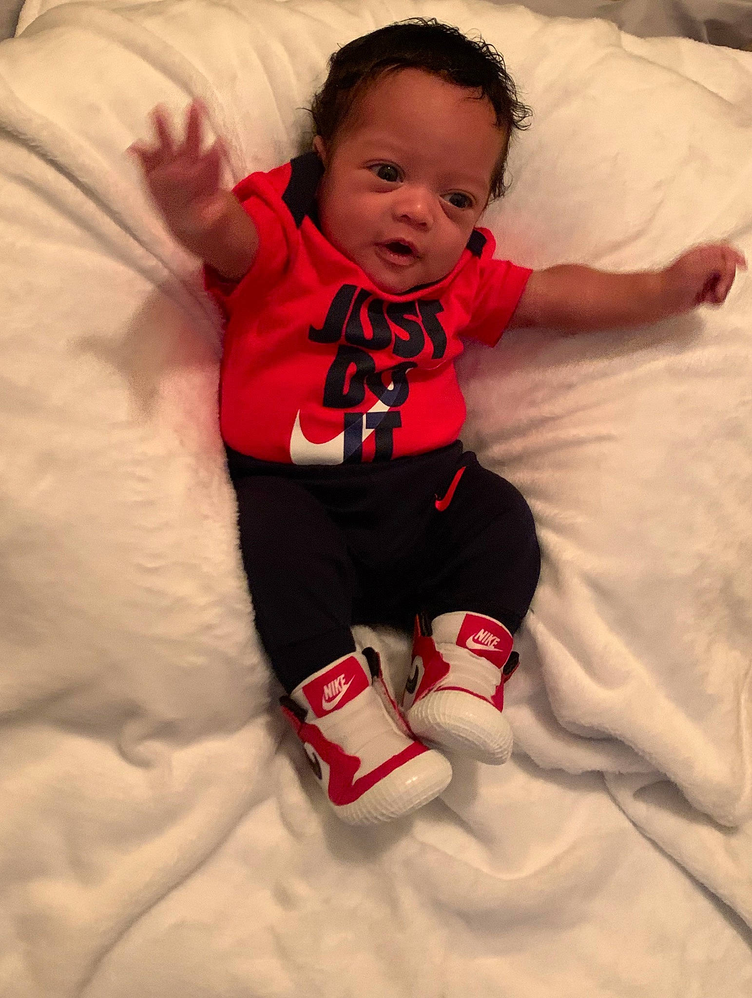 Jersey is registered to the contest to win money with this photo: arm, baby, child, leg, person, skin, smile, textile, toddler, white