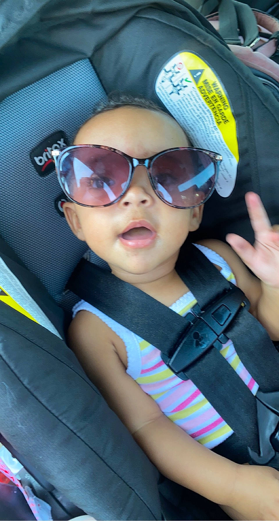 Vailynn is registered to the contest to win money with this photo: automotive_design, automotive_exterior, baseball_cap, cap, car_seat, car_seat_cover, child, electric_blue, eyewear, family_car, fashion_accessory, fun, glasses, goggles, happy, person, personal_protective_equipment, sunglasses, toddler, vehicle_door