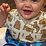toddler, child, smiling, walker, toy, blue, shirt, indoor, happy, person, face, playful, cute, baby, clothing, young, expression, sitting, fun, bright