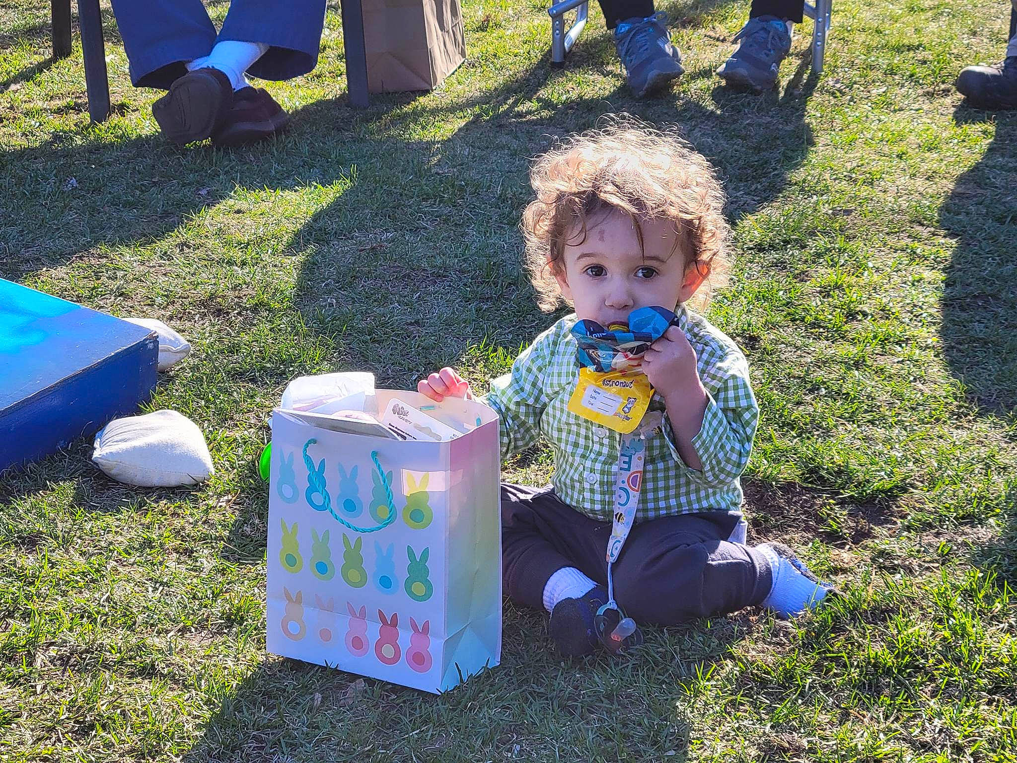 Braylen joined the competition — help win amazing prizes! blue, chair, child, community, electric_blue, event, fun, grass, grass_family, green, lawn, leisure, nature, people, person, photograph, public_space, recreation, sitting, spring