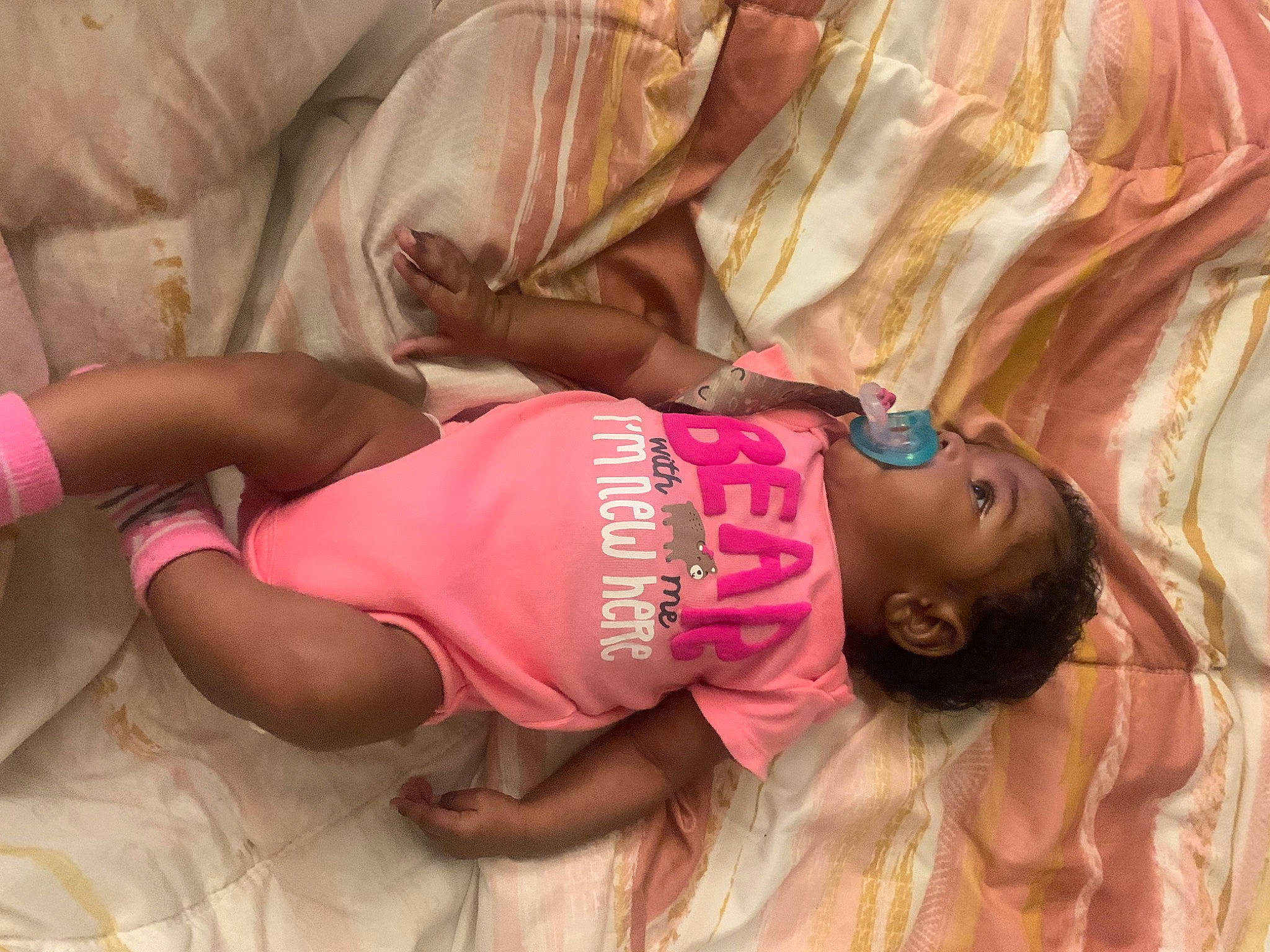 Amiyah joined the competition — help win amazing prizes! abdomen, baby, baby_toddler_clothing, child, comfort, elbow, foot, fun, happy, human_leg, leisure, magenta, person, pink, skin, t_shirt, textile, thigh, toddler, tree