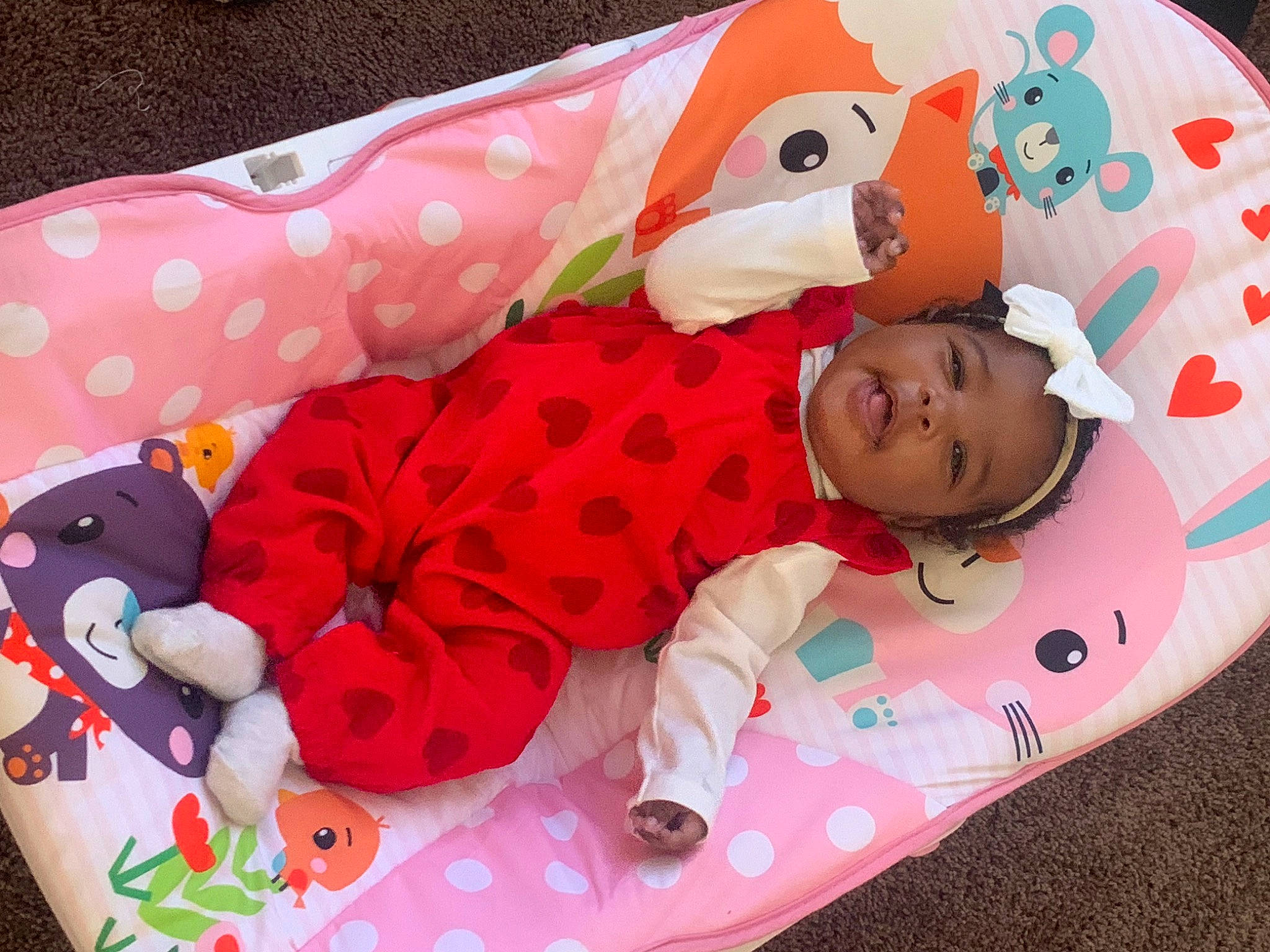 Amiyah is registered to the contest to win money with this photo: baby, baby_products, baby_sleeping, baby_toddler_clothing, bedding, carmine, child, comfort, event, fictional_character, happy, linens, magenta, pattern, person, pink, product, room, sleeve, textile