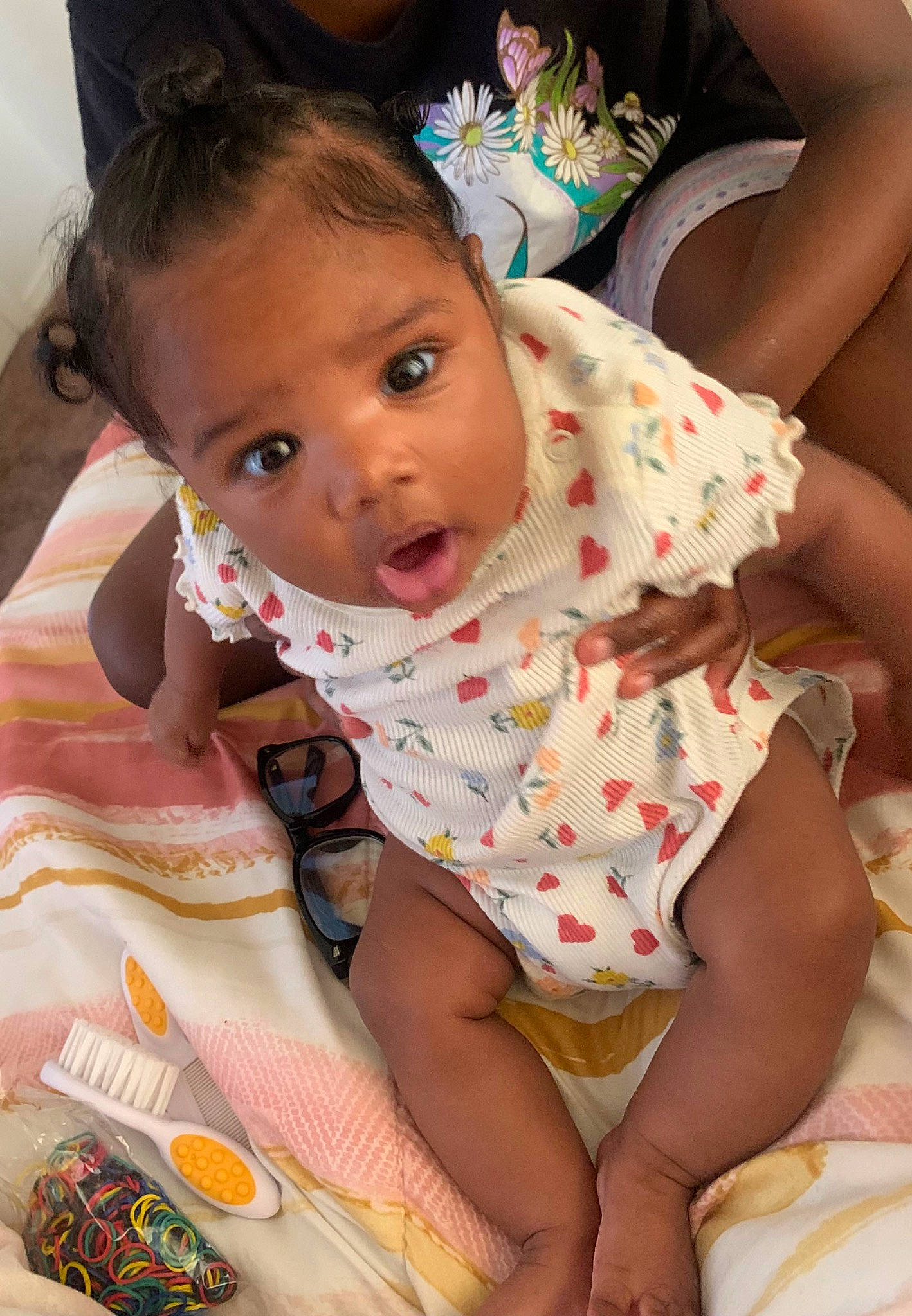 Amiyah is registered to the contest to win money with this photo: baby, baby_toddler_clothing, cheek, child, comfort, eye, eyelash, facial_expression, finger, fun, happy, head, iris, lip, mouth, nose, pattern, person, skin, thigh