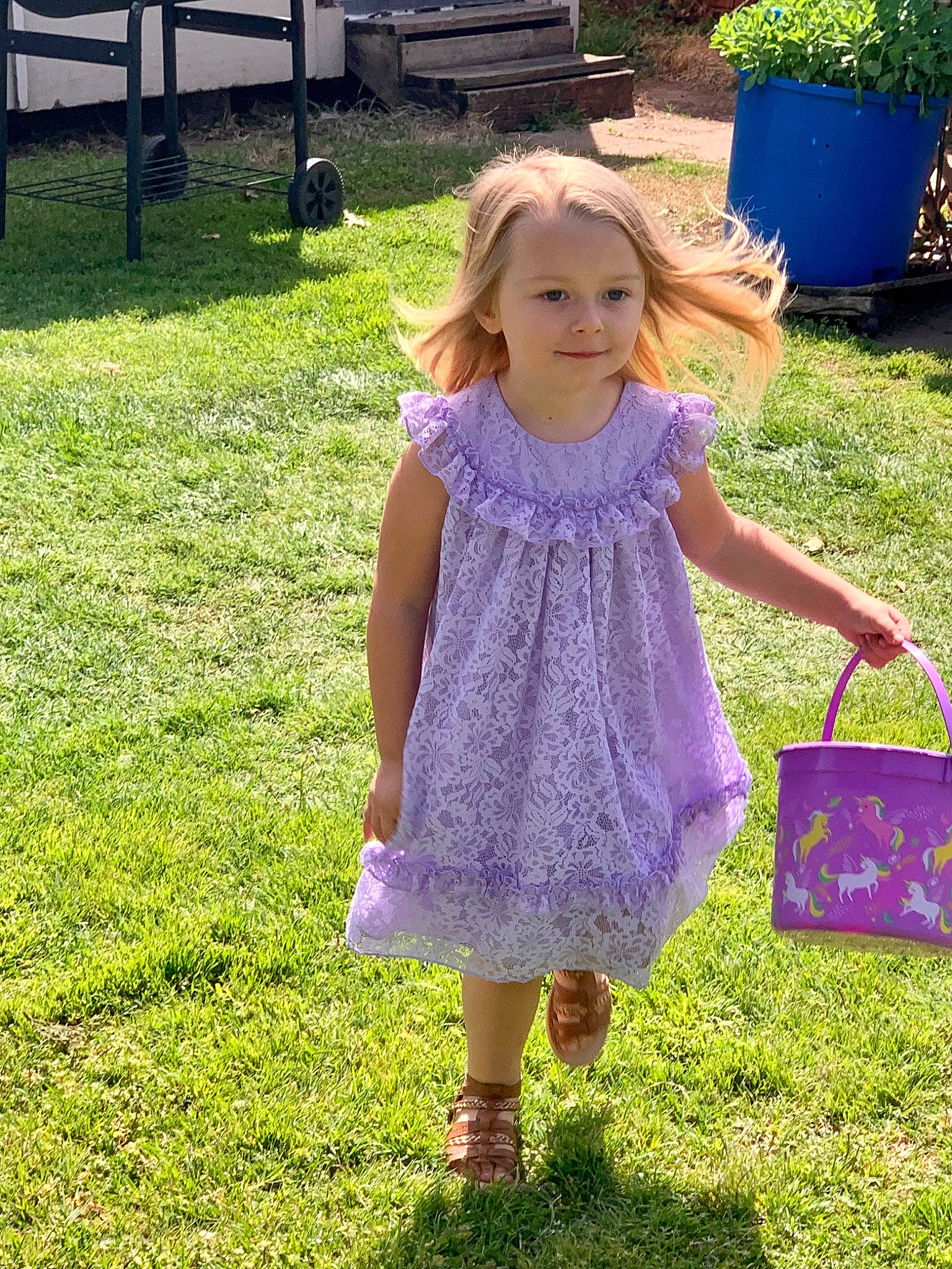 Hendrix is registered to the contest to win money with this photo: baby_toddler_clothing, child, dress, flowerpot, grass, grass_family, green, happy, joy, magenta, people_in_nature, person, pink, plant, purple, recreation, sleeve, smile, standing, summer