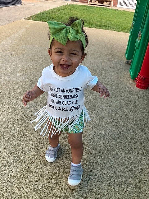 Addison is registered to the contest to win money with this photo: asphalt, baby, baby_toddler_clothing, child, event, flooring, fun, grass, green, happy, head, headwear, holiday, joy, leisure, mammal, person, play, recreation, sleeve