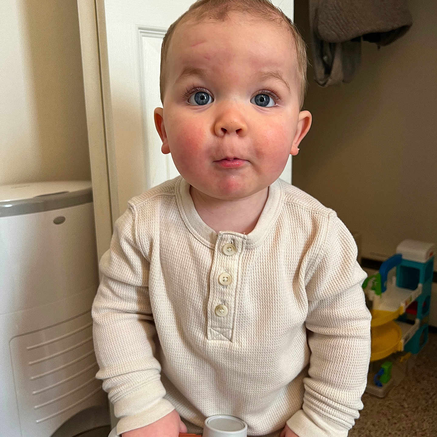 Krue joined the competition — help win amazing prizes! baby, bathroom, bodypart, clothing, face, finger, hand, head, indoors, knitwear, longsleeve, pants, person, photography, portrait, room, sitting, sleeve, sweater, toilet