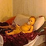 toddler, child, pacifier, couch, blanket, pillow, indoor, relaxed, curious, clothing, furniture, person, home, cozy, soft, resting, comfort, young, infant, casual
