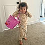 Julieta joined the competition — help win amazing prizes! barefoot, carpet, child, cookie_pattern, curious, curly_hair, cute, door, face, home, indoor, light_switch, pajamas, person, pink_bucket, standing, toddler, toy_bucket, wall, young_child