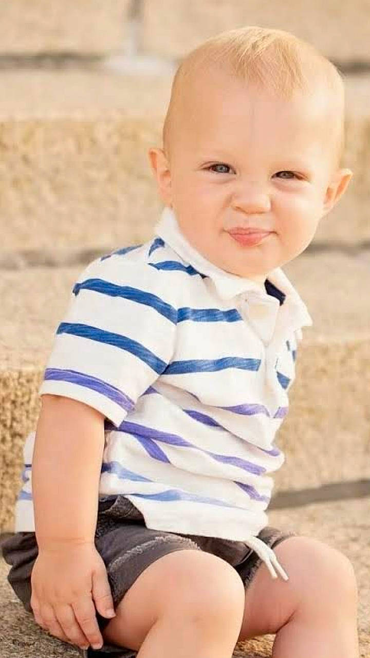 Jensen joined the competition — help win amazing prizes! baby, baby_toddler_clothing, cheek, child, child_model, leg, person, play, product, sitting, sleeve, smile, t_shirt, thigh, toddler
