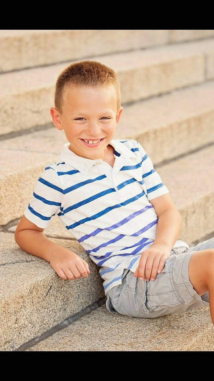 Kellan joined the competition — help win amazing prizes! baby, baby_toddler_clothing, child, child_model, joy, male, pattern, person, photograph, photography, play, portrait, portrait_photography, sitting, sleeve, smile, t_shirt, toddler