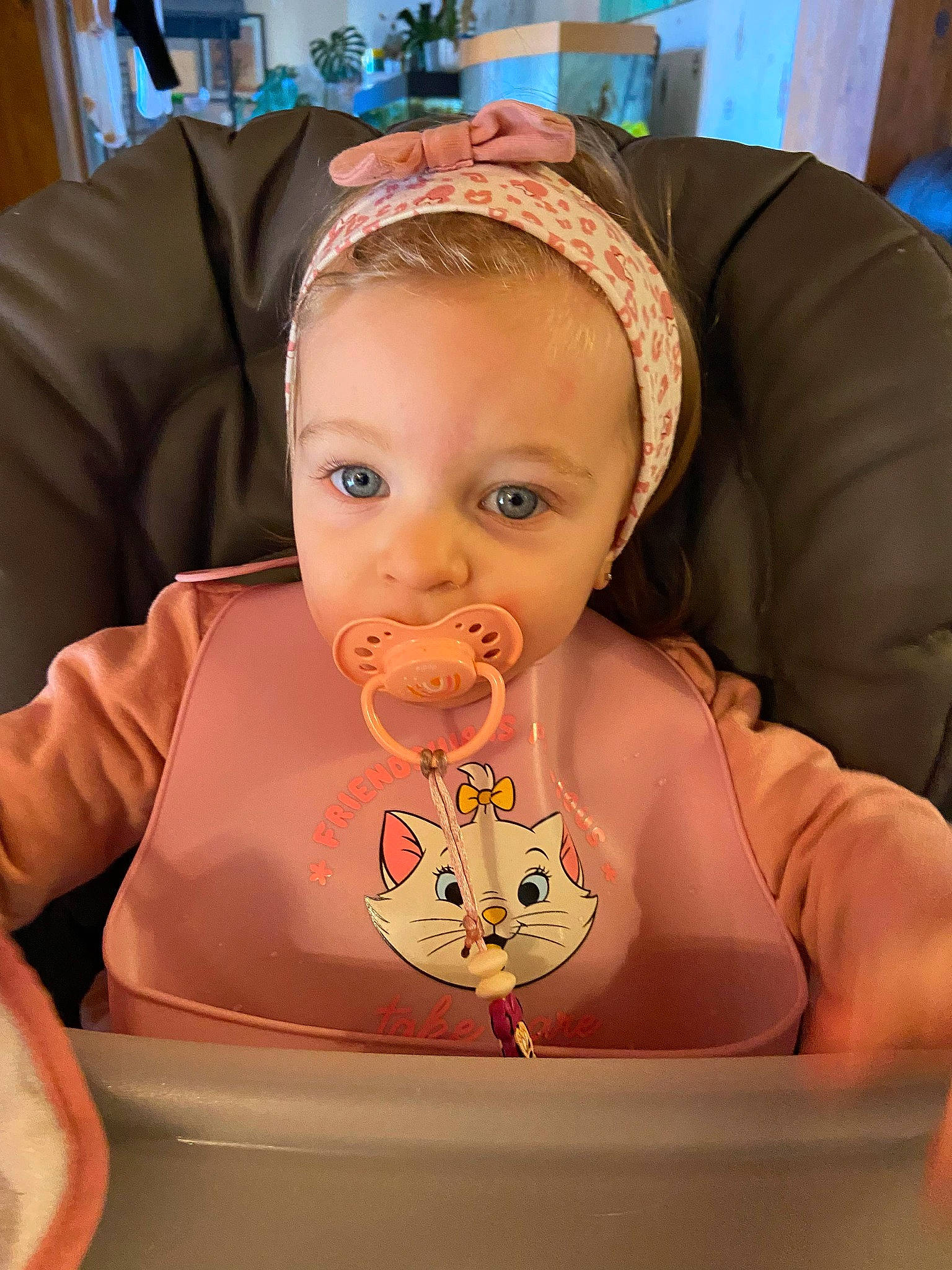 Maddy participe au concours pour gagner de l'argent avec cette photo : baby, baby_products, baby_toddler_clothing, bathing, chair, cheek, child, chin, comfort_food, drinkware, eating, fashion_accessory, fun, happy, person, pink, sitting, sweetness, tableware, toddler