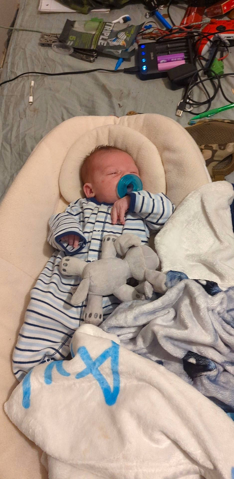 Axle joined the competition — help win amazing prizes! abdomen, baby, baby_products, baby_sleeping, baby_toddler_clothing, bedding, bedtime, blanket, blue, child, comfort, linens, nap, pattern, person, room, skin, sleep, thumb, toddler