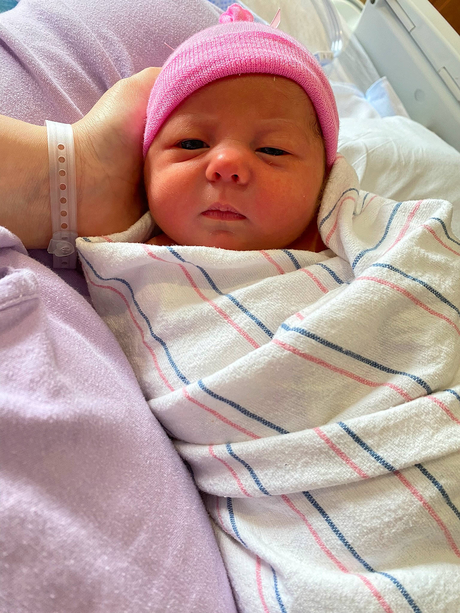 Eleanor is registered to the contest to win money with this photo: baby, baby_products, baby_safety, baby_sleeping, baby_toddler_clothing, bedding, bedtime, cap, cheek, child, chin, comfort, hat, headwear, linens, mammal, nose, person, room, skin