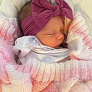Rachel joined the competition — help win amazing prizes! newborn, baby, sleeping, blanket, knitted, pink, white, headband, bow, cozy, infant, wrapped, soft, cute, portrait, child, peaceful, resting, indoors, closeup