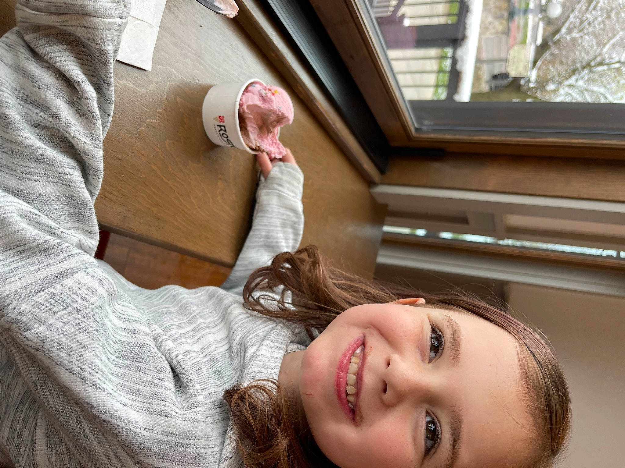 Kathleen is registered to the contest to win money with this photo: brown_hair, comfort, elbow, eyelash, finger, flash_photography, flooring, fun, gesture, hand, happy, human, human_leg, jewellery, joy, lip, person, room, sitting, smile