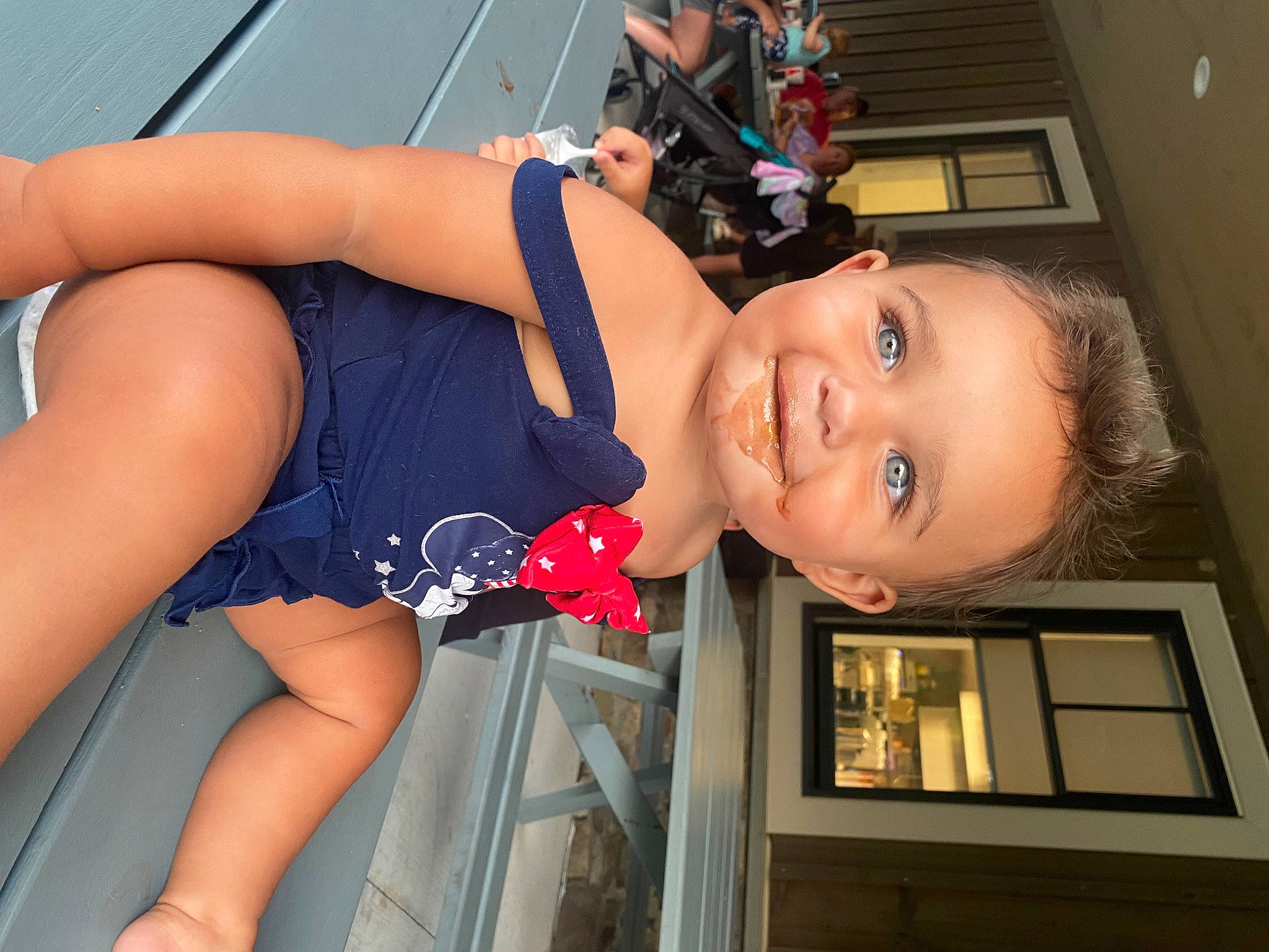 Adley is registered to the contest to win money with this photo: abdomen, calf, chest, dress, elbow, electric_blue, fun, happy, human_leg, joint, joy, knee, leg, mouth, muscle, orange, person, smile, thigh, toddler