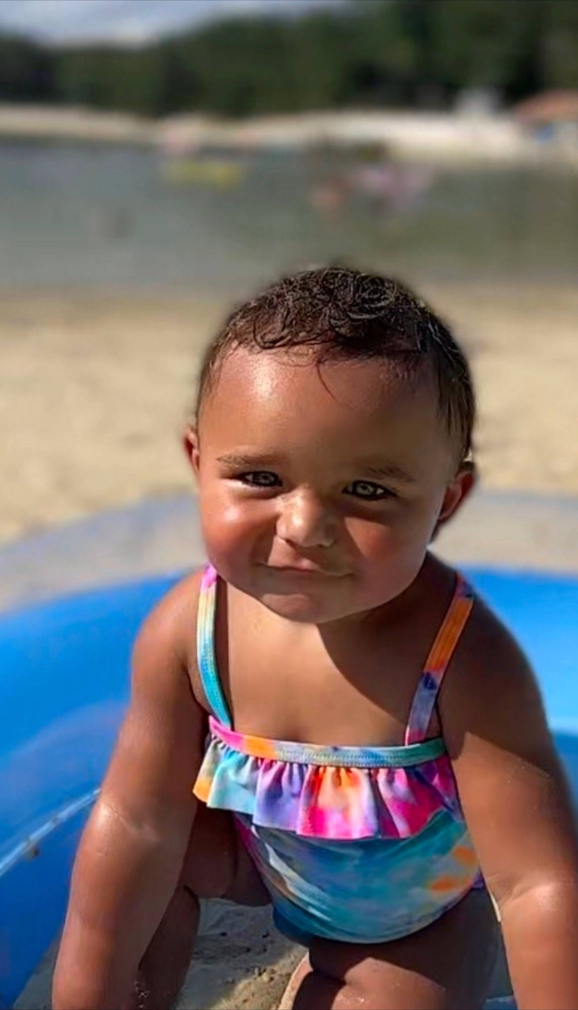 Adley is registered to the contest to win money with this photo: azure, baby, baby_toddler_clothing, bathing, chest, child, fun, happy, joy, leisure, nonbuilding_structure, person, personal_protective_equipment, play, recreation, sitting, skin, smile, sunlight, swimming_pool