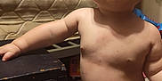 Eric joined the competition — help win amazing prizes! arm, baby, barefoot, child, diaper, floor, furniture, happy, head, home, indoor, leg, mattress, person, room, skin, smile, standing, table, toy