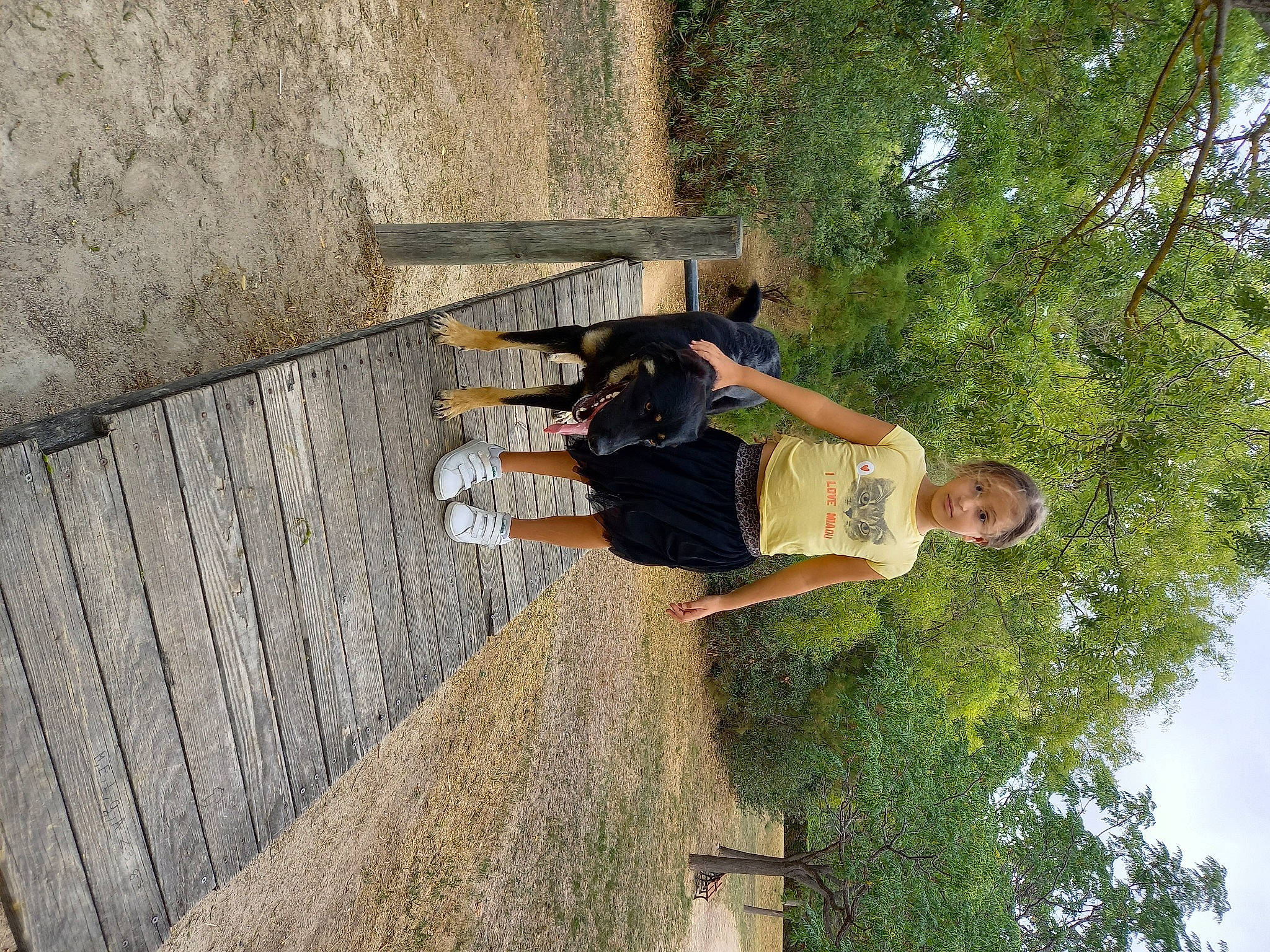 Rania participe au concours pour gagner de l'argent avec cette photo : adventure, concrete, fun, grass, leisure, people_in_nature, person, plant, recreation, shadow, sky, stairs, t_shirt, tree, walking_shoe, wood