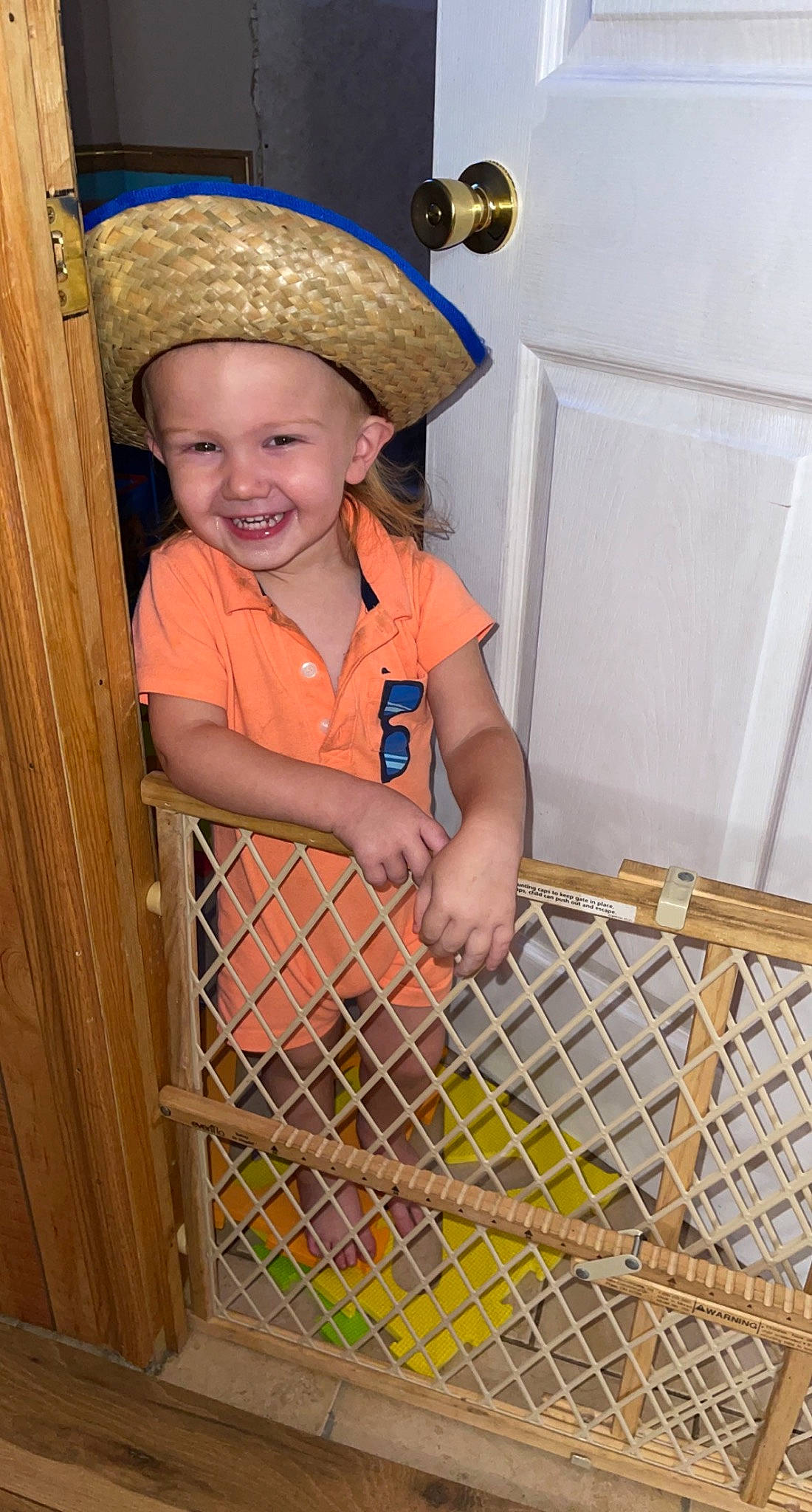 Kamden is registered to the contest to win money with this photo: baby, baby_toddler_clothing, cap, child, costume_hat, cowboy_hat, door, fashion_accessory, fun, happy, hat, headwear, joy, mesh, pattern, person, photograph, room, smile, sun_hat