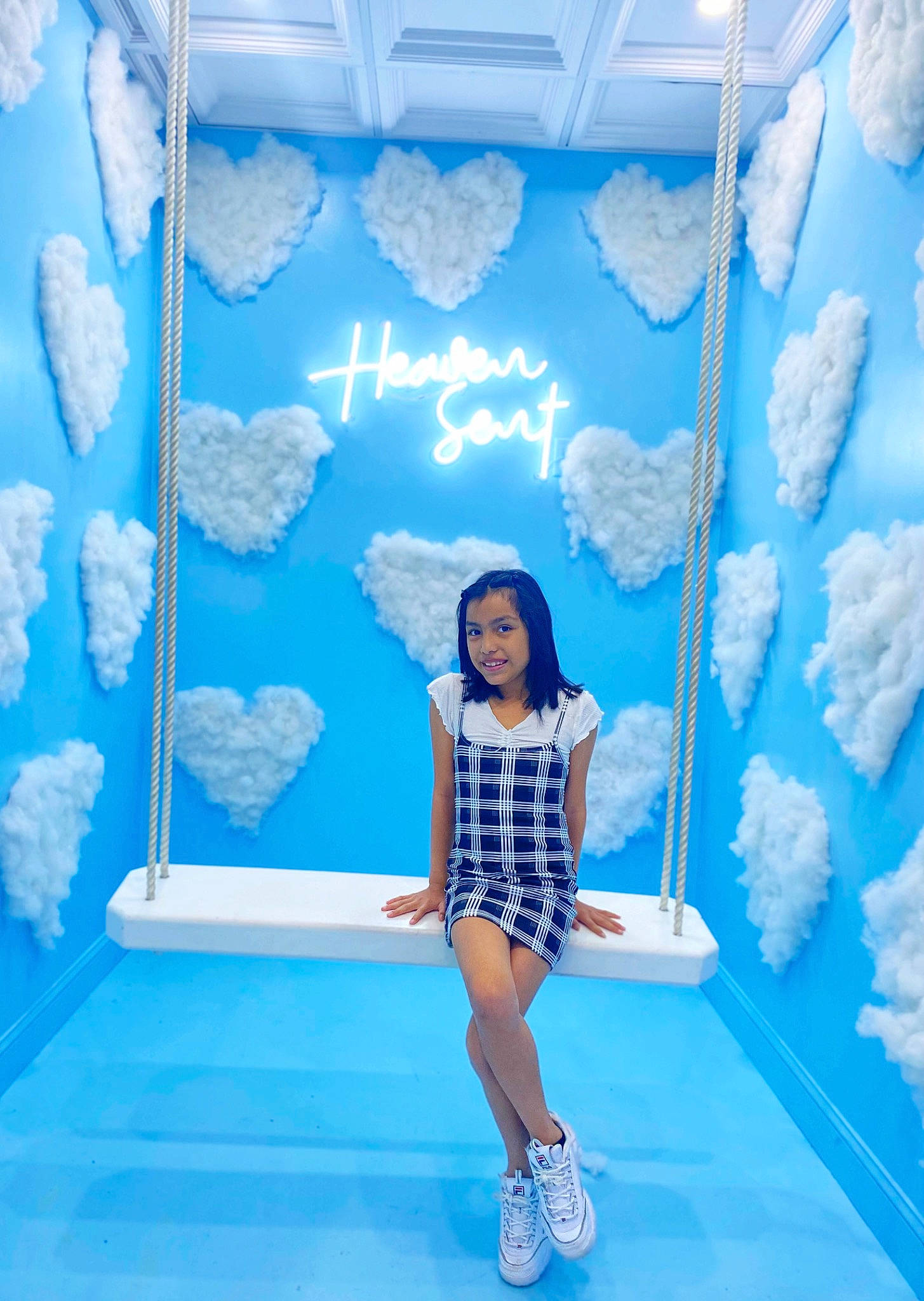 Yasmine is registered to the contest to win money with this photo: aqua, azure, blue, ceiling, electric_blue, fashion_design, flooring, fun, happy, human_leg, interior_design, joy, knee, leisure, organism, person, shorts, smile, textile, thigh