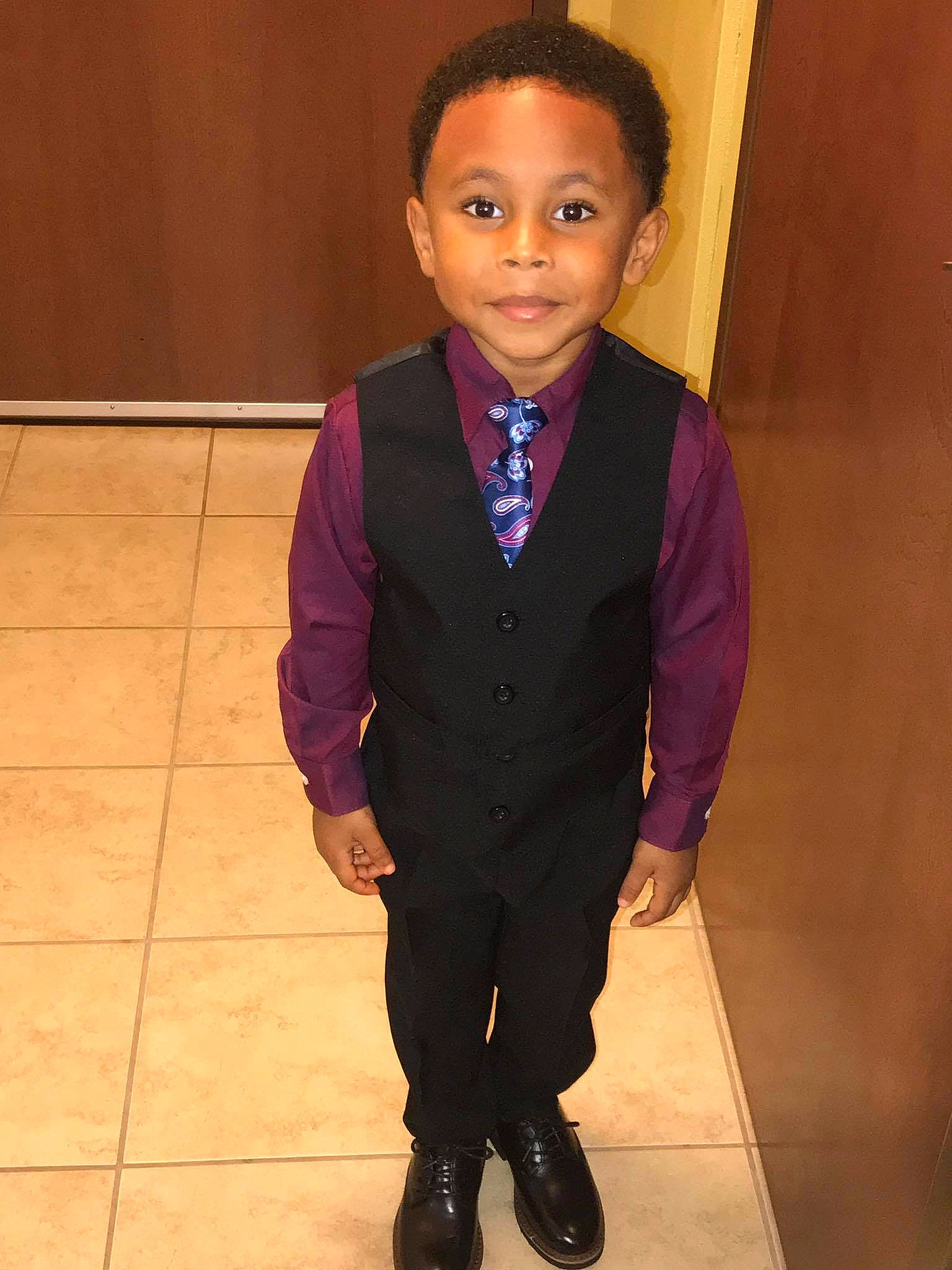 Ja'Marion is registered to the contest to win money with this photo: blazer, child, formal_wear, gentleman, outerwear, person, standing, suit, toddler, tuxedo