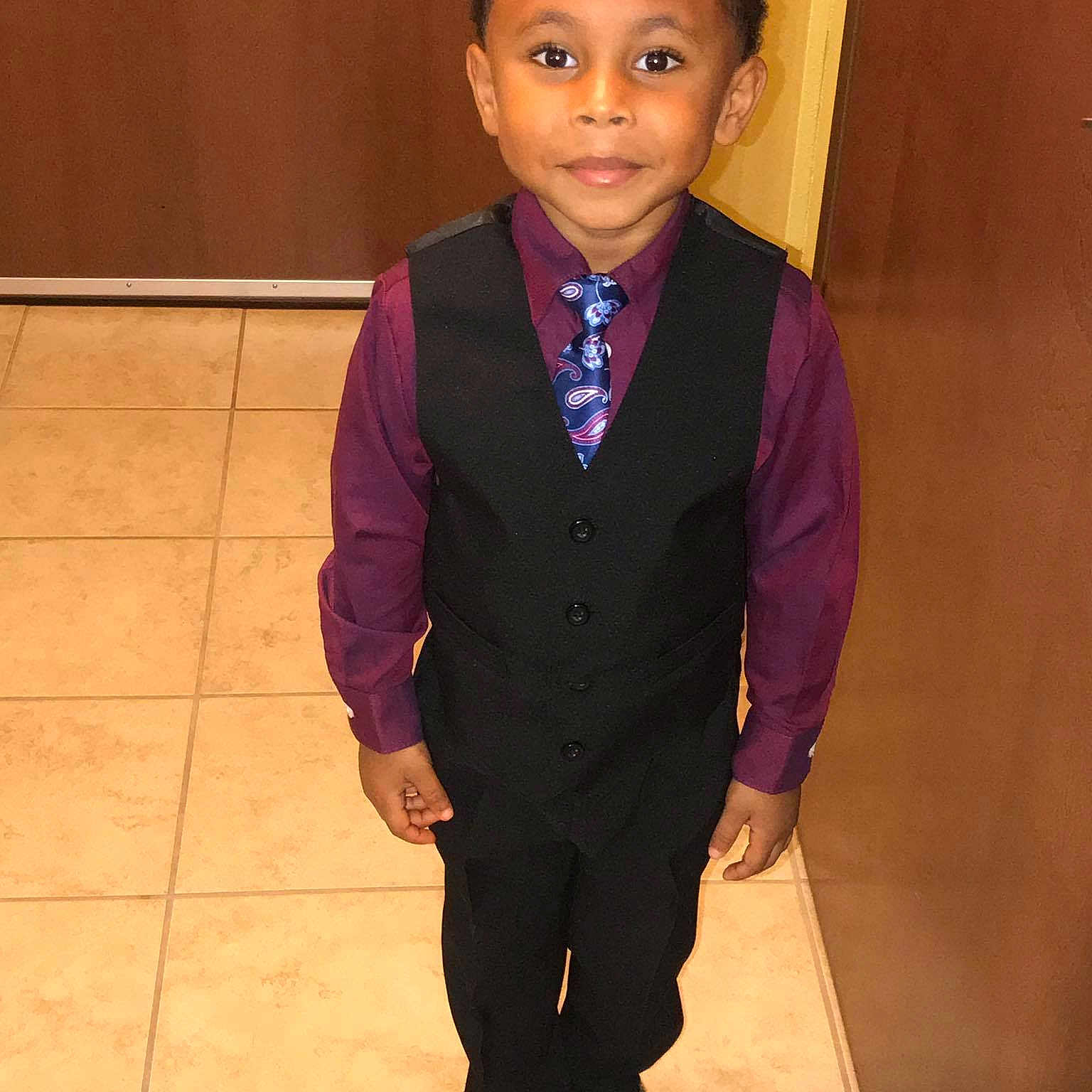 Ja'Marion is registered to the contest to win money with this photo: blazer, child, formal_wear, gentleman, outerwear, person, standing, suit, toddler, tuxedo