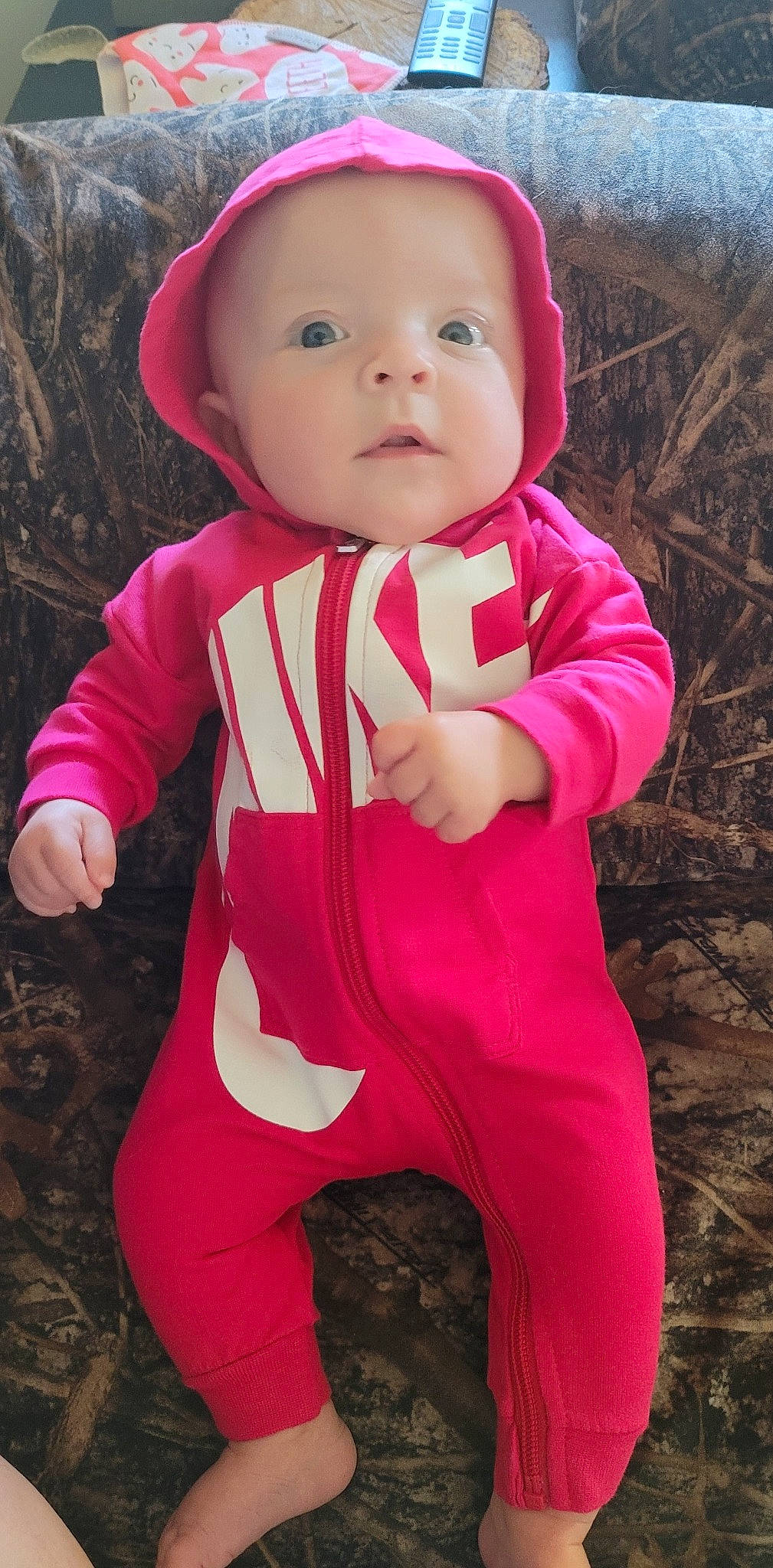 Oaklyn joined the competition — help win amazing prizes! arm, baby, baby_toddler_clothing, cheek, finger, hand, happy, head, headwear, human_body, lip, neck, nose, outerwear, person, photograph, pink, skin, sleeve, smile