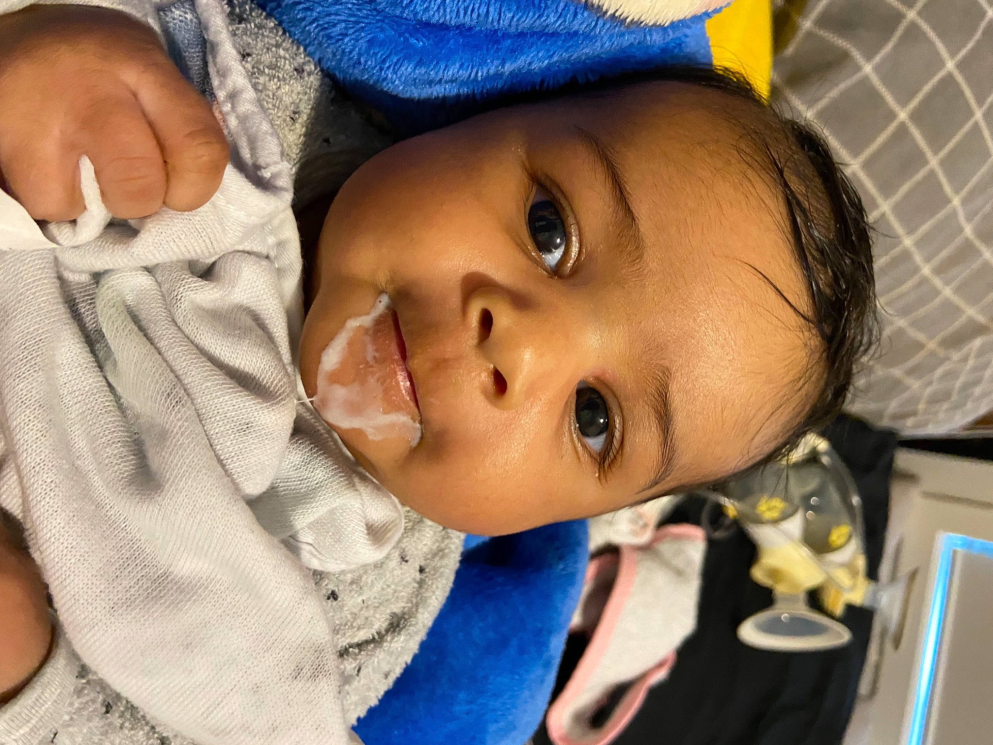 Rae is registered to the contest to win money with this photo: baby, baby_products, baby_toddler_clothing, blue, cap, cheek, child, eye, eyelash, face, facial_expression, happy, hat, lip, mouth, nose, pattern, person, skin, smile