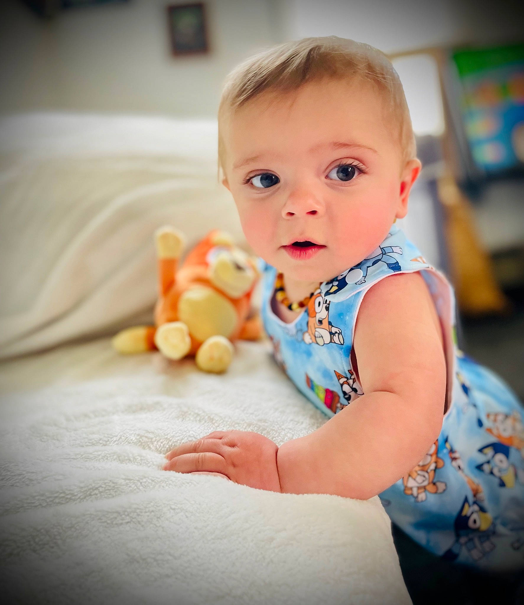 Orrin is registered to the contest to win money with this photo: arm, baby, baby_toddler_clothing, cheek, child, chin, eye, face, facial_expression, flash_photography, floor, fun, happy, head, iris, person, sitting, skin, sleeve, standing