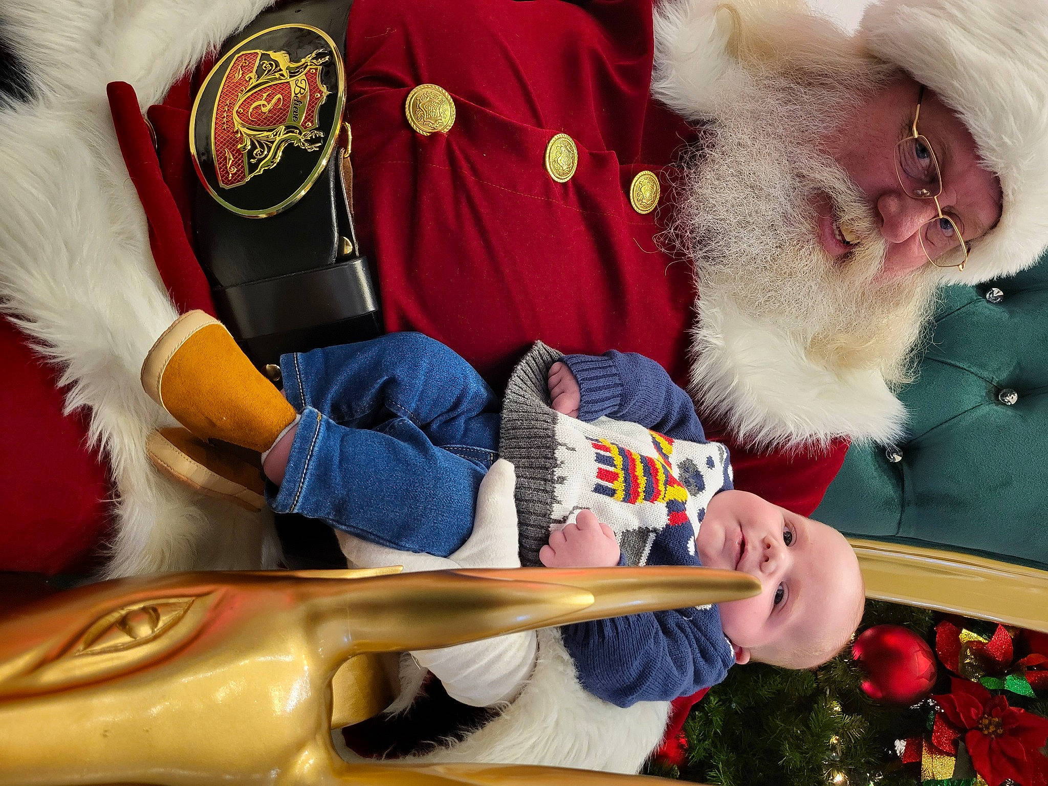 Jonathan is registered to the contest to win money with this photo: beard, carmine, christmas, christmas_eve, costume_hat, elbow, event, fictional_character, fun, fur, hat, headwear, holiday, human_body, human_leg, lap, person, photograph, red, santa_claus