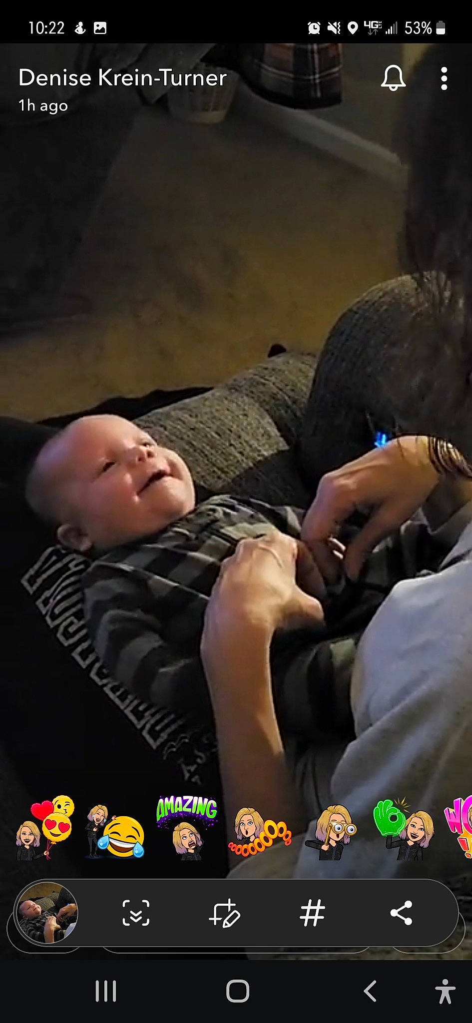 Jonathan is registered to the contest to win money with this photo: child, darkness, flash_photography, font, fun, grass, happy, interaction, leisure, logo, person, photo_caption, recreation, sitting, t_shirt