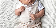 Danté joined the competition — help win amazing prizes! adorable, baby, bow_tie, child, cute, expression, fashion, feet, hands, indoor, infant, knitted_blanket, lying_down, newborn, pants, portrait, socks, soft_texture, vest, white_blanket