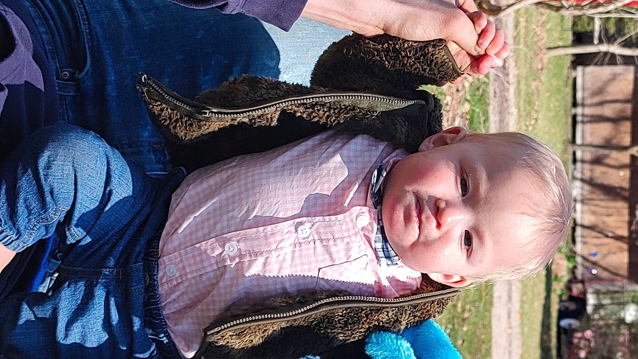 Thomas is registered to the contest to win money with this photo: baby, baby_products, child, electric_blue, fashion_accessory, fun, grass, hand, happy, hat, mouth, pattern, person, plant, sitting, toddler, tree, window