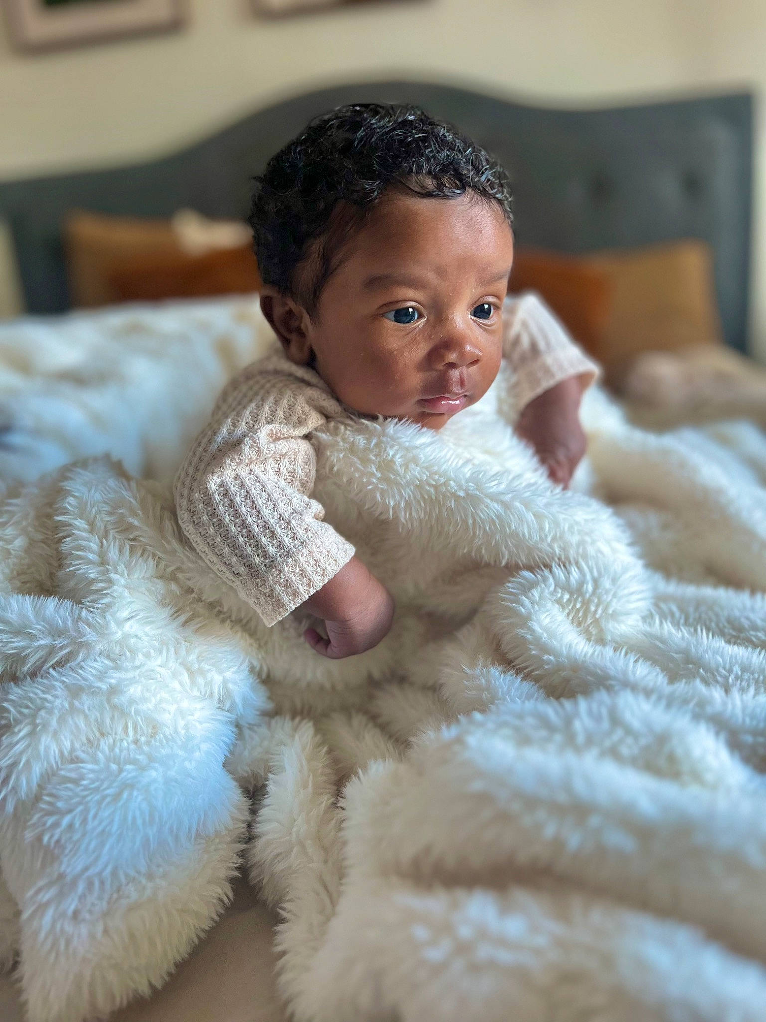 Houston is registered to the contest to win money with this photo: baby, baby_sleeping, baby_toddler_clothing, cheek, child, comfort, eye, eyebrow, eyelash, fashion_accessory, flooring, fur, fur_clothing, iris, linens, nose, person, room, skin, toddler