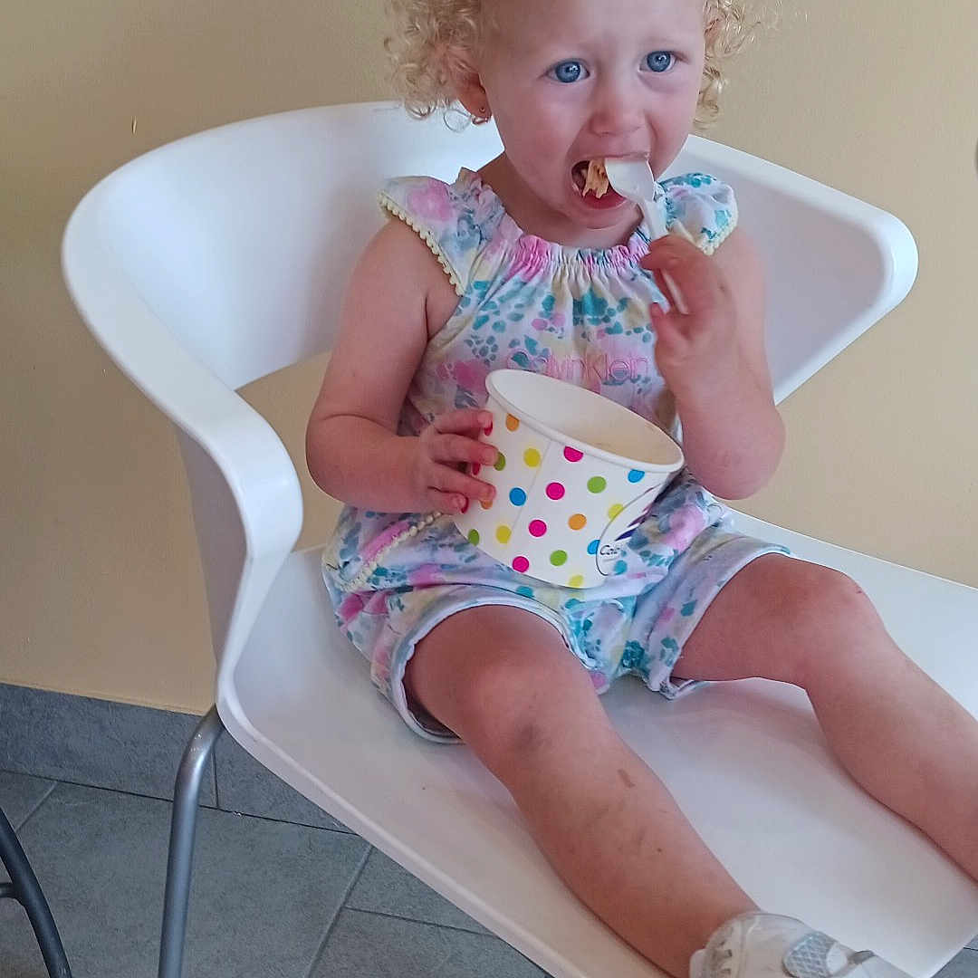 Savannah joined the competition — help win amazing prizes! baby, chair, clothing, cream, cutlery, dessert, face, food, footwear, furniture, head, icecream, icing, person, photography, portrait, shoe, sitting, spoon, sweets