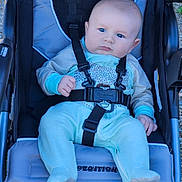 Rowel is registered to the contest to win money with this photo: accessories, adventure, baby, bed, belt, bodypart, bungee, car, car_interior, carseat, clothing, crib, cushion, face, finger, furniture, hand, harness, hat, head