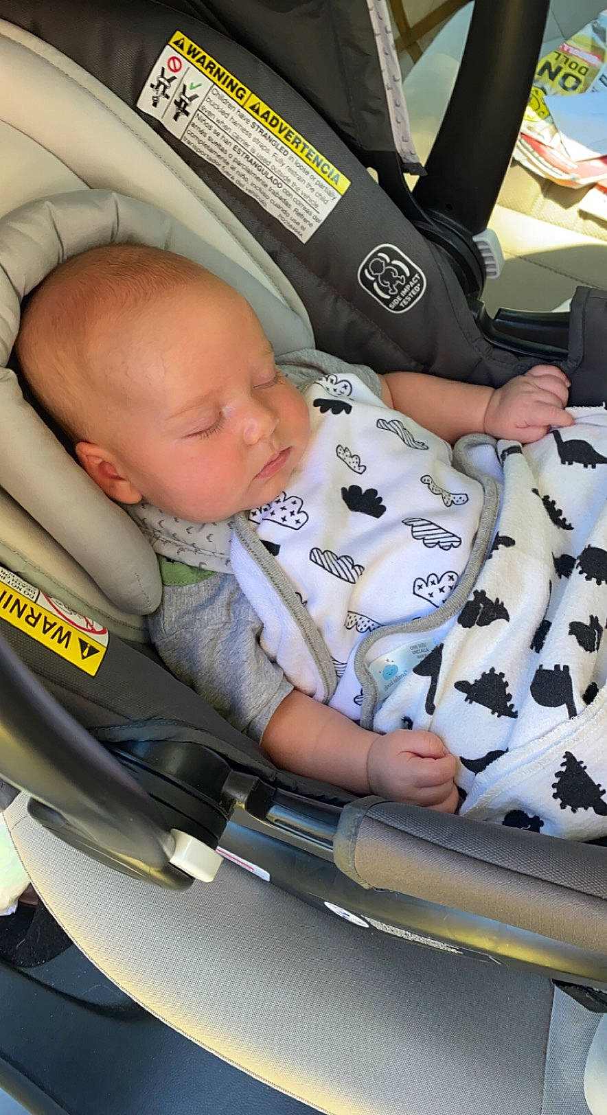 Lyle is registered to the contest to win money with this photo: auto_part, baby, baby_carriage, baby_in_car_seat, baby_products, baby_safety, baby_toddler_clothing, car_seat, child, comfort, design, finger, infant_bed, mammal, person, product, room, sitting, thumb, toddler