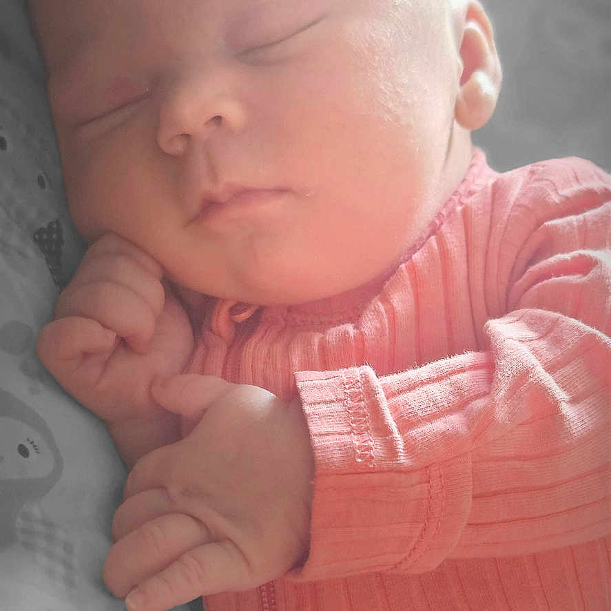 Nora joined the competition — help win amazing prizes! baby, blanket, bodypart, clothing, face, finger, hand, head, knitwear, newborn, person, photography, portrait, quilt, sleeping, sweater