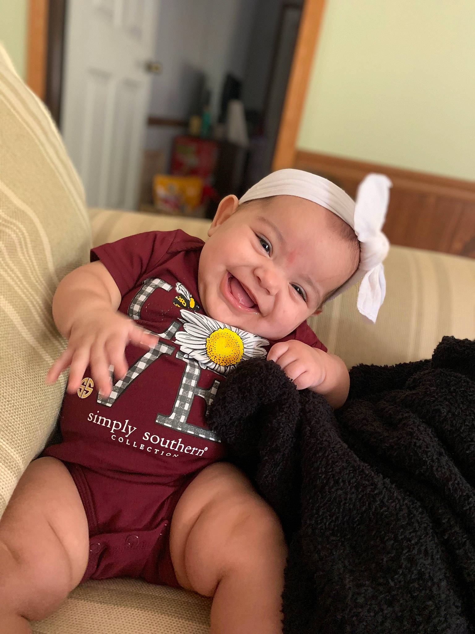 Norah joined the competition — help win amazing prizes! baby, baby_toddler_clothing, comfort, elbow, foot, happy, hat, head, human_leg, joy, knee, lap, nail, person, sleeve, smile, sock, thigh, thumb, toddler