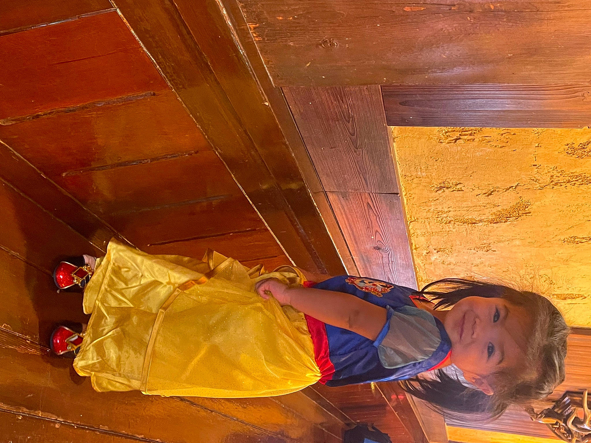 Keziah joined the competition — help win amazing prizes! ceiling, event, floor, flooring, fun, hardwood, human_leg, joy, landscape, leisure, luggage_and_bags, orange, person, room, thigh, tints_and_shades, toddler, tree, wood