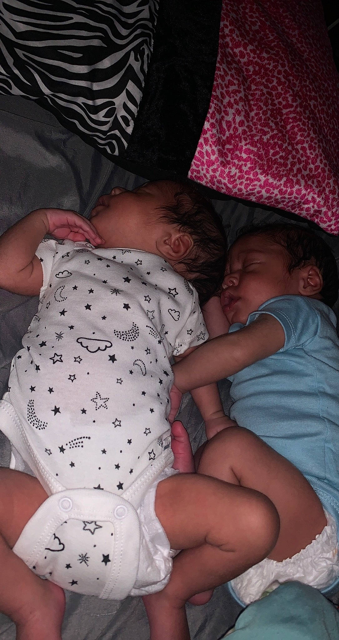 Lamar And Keon joined the competition — help win amazing prizes! arm, baby, baby_toddler_clothing, black, comfort, facial_expression, finger, hairstyle, hand, human_body, interaction, lap, leg, mouth, muscle, person, pink, skin, thigh, trunk