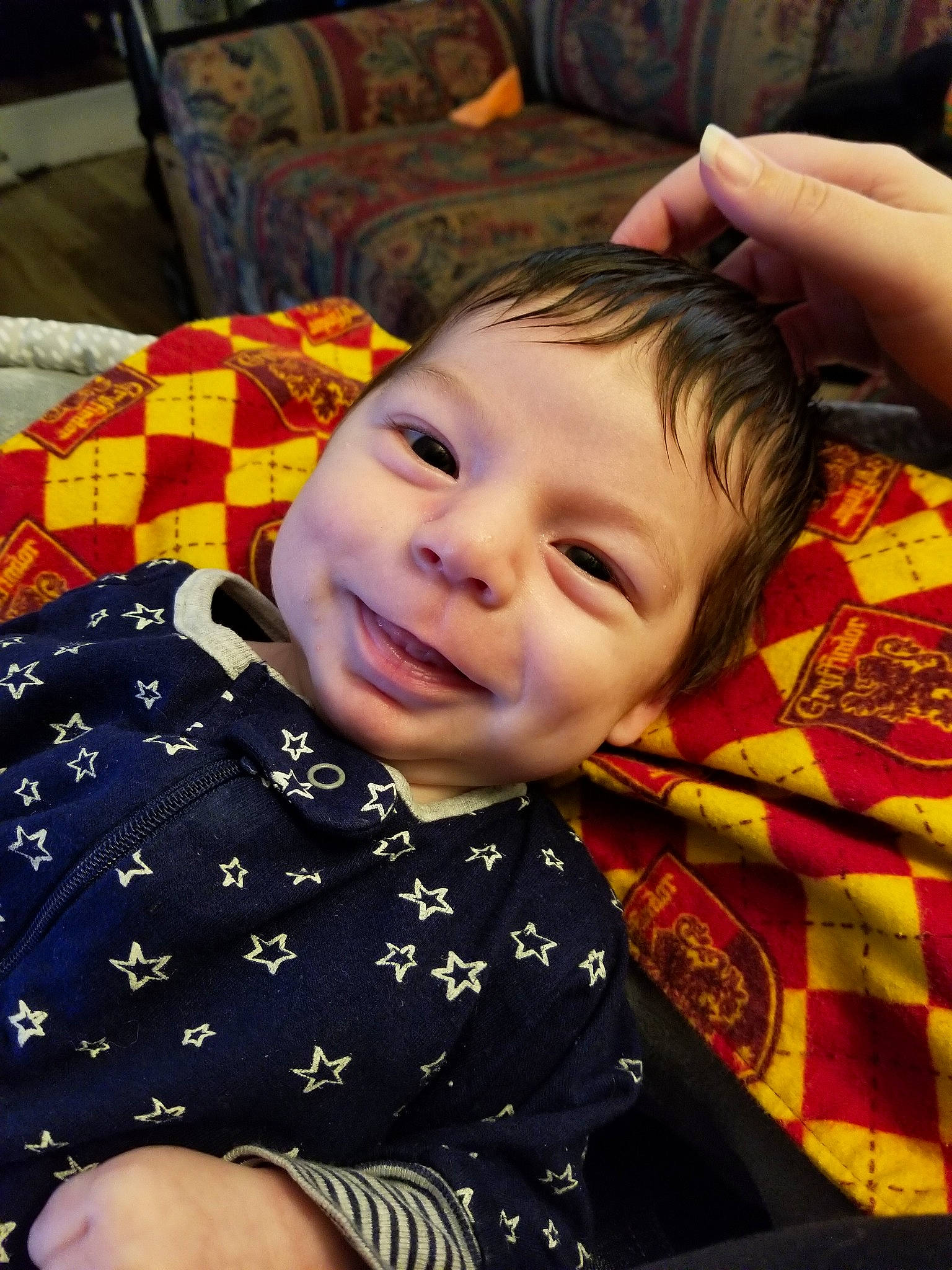 Alistair is registered to the contest to win money with this photo: baby, cheek, child, face, head, person, smile, toddler